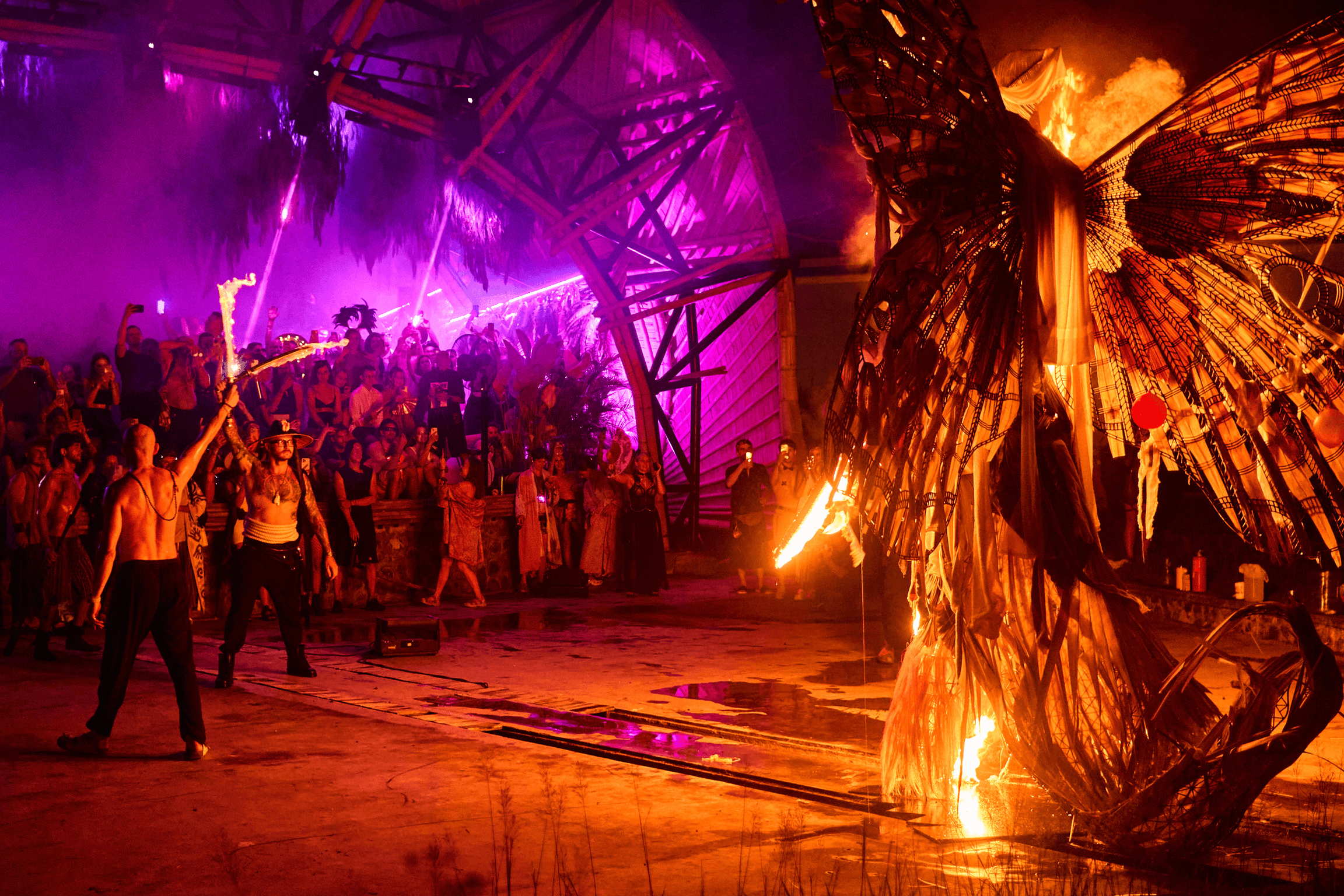 Large ceremonial burning of MOTH before a crowd