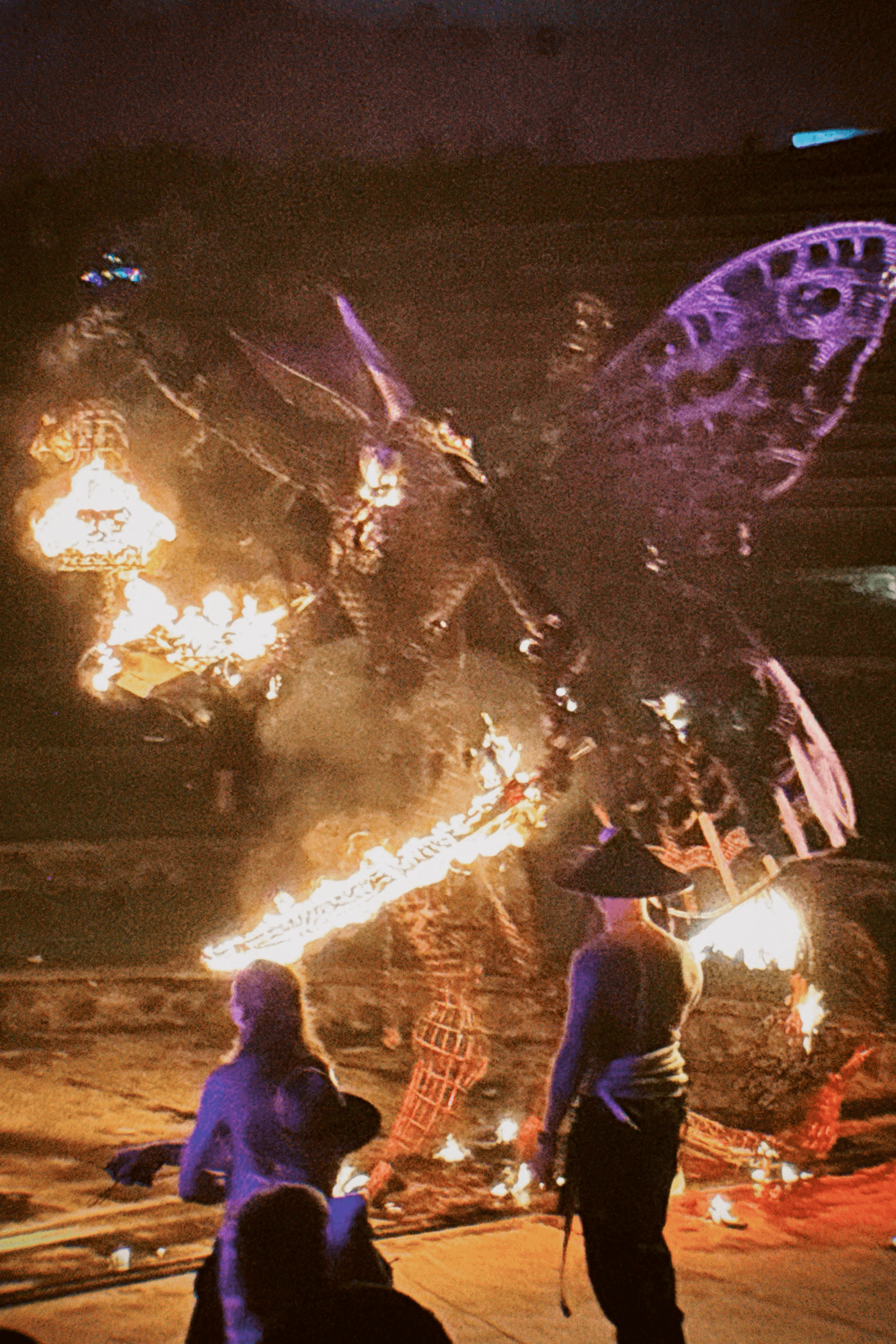 MOTH sculpture lit by fire at Lampu, Bali